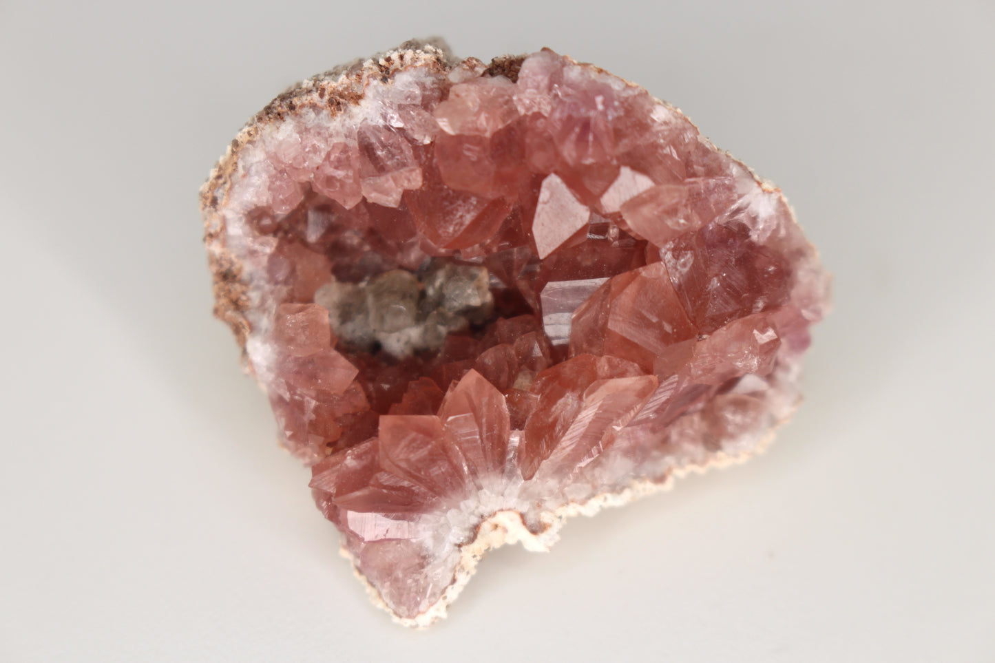 UV Reactive Calcite in Pink Amethyst Geode