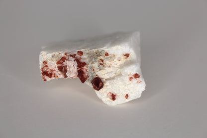 Spessartine Garnet on Feldspar