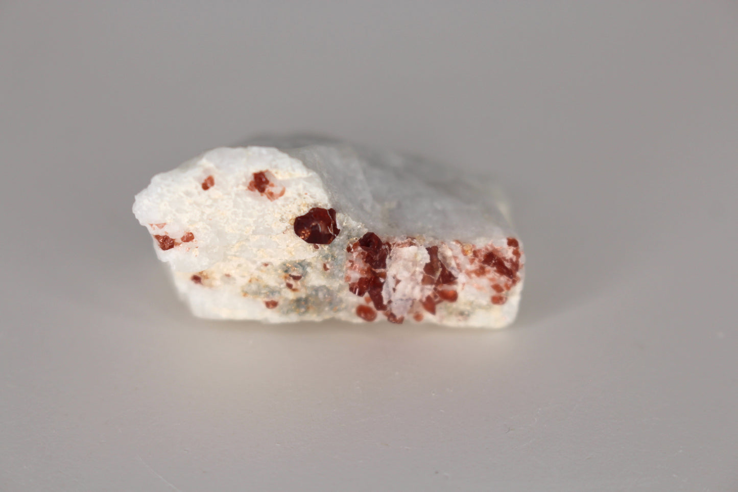 Spessartine Garnet on Feldspar