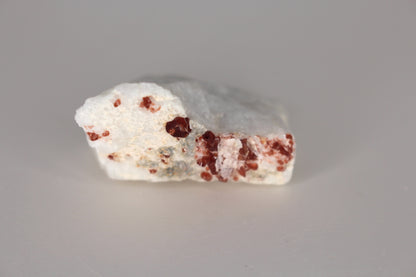 Spessartine Garnet on Feldspar