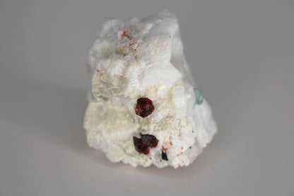 Spessartine Garnets on Quartz w/ Aquamarine, Mica, Feldspar and Schorl