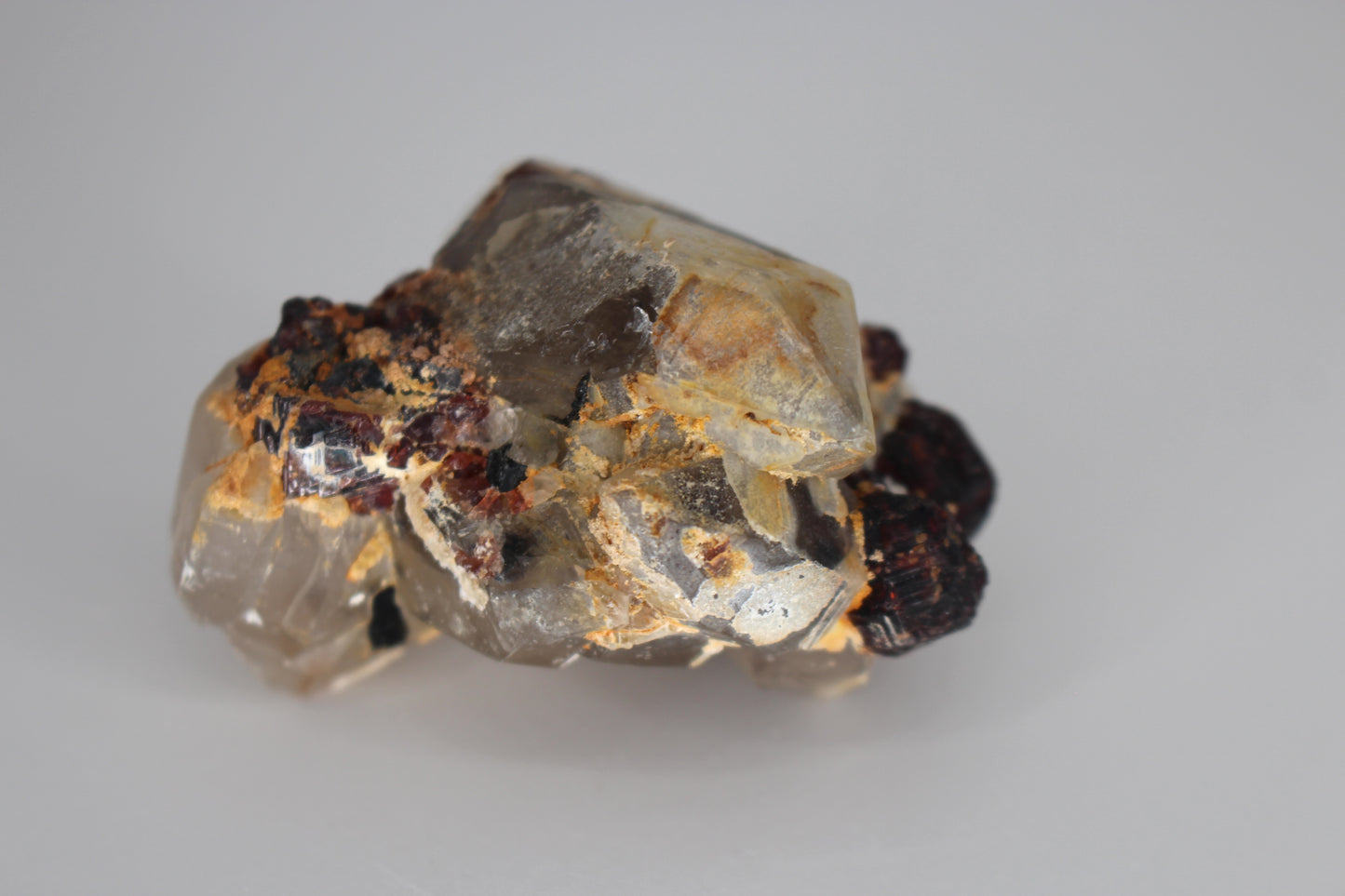 Etched Spessartine Garnet on Quartz w/ Schorl