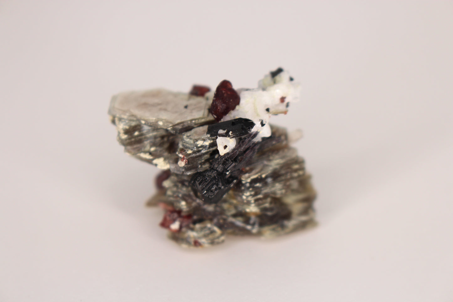 Spessartine Garnets on Mica w/ Feldspar and Schorl