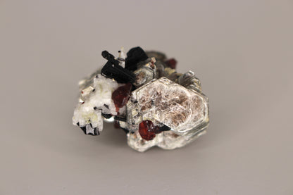 Spessartine Garnets on Mica w/ Feldspar and Schorl