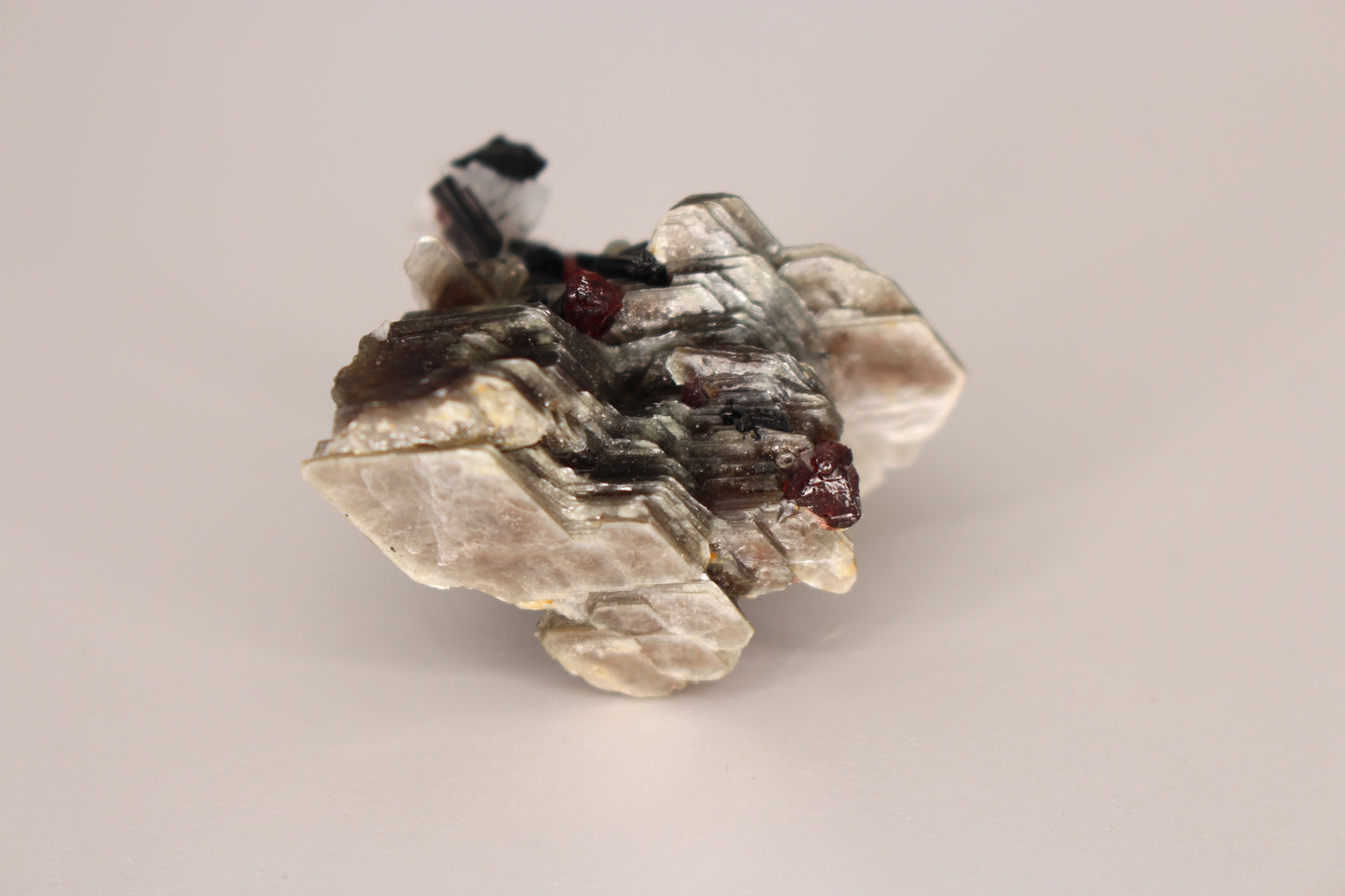 Spessartine Garnets on Mica w/ Feldspar and Schorl