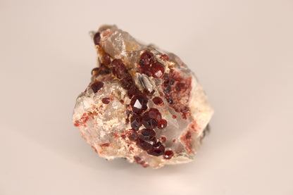 Spessartine Garnets on Quartz w/ Mica, Feldspar and Schorl