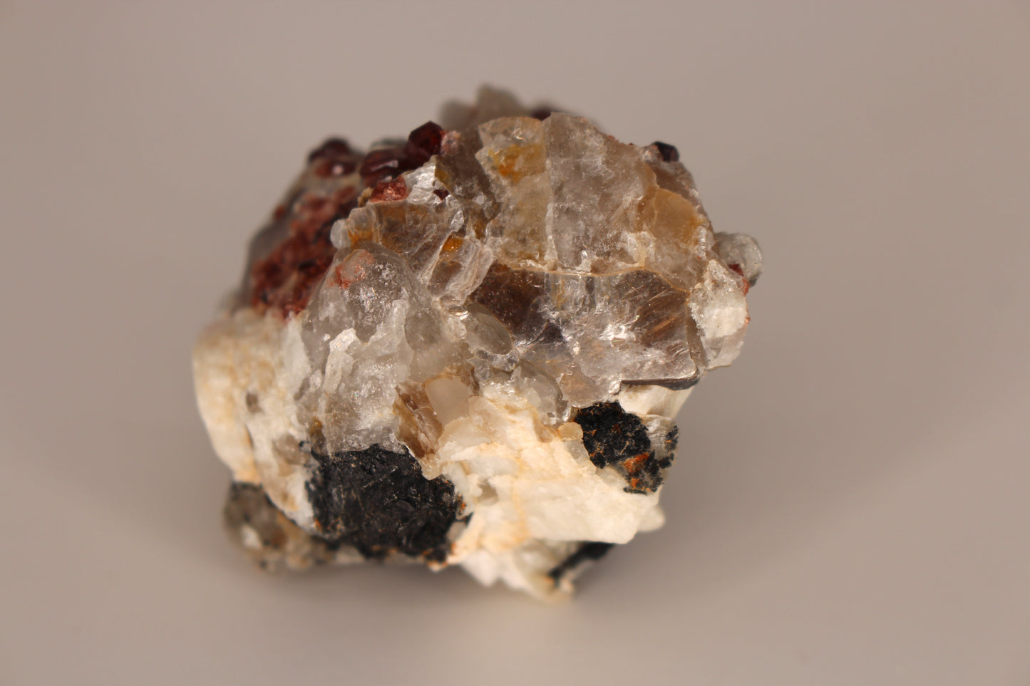 Spessartine Garnets on Quartz w/ Mica, Feldspar and Schorl