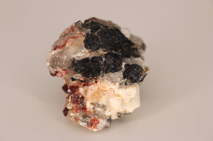 Spessartine Garnets on Quartz w/ Mica, Feldspar and Schorl