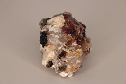 Spessartine Garnets on Quartz w/ Mica, Feldspar and Schorl