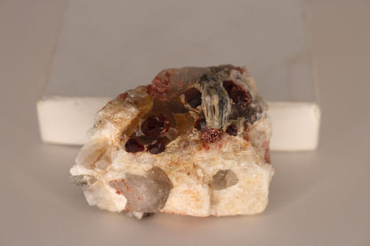 Spessartine Garnets on Quartz w/ Mica and Feldspar