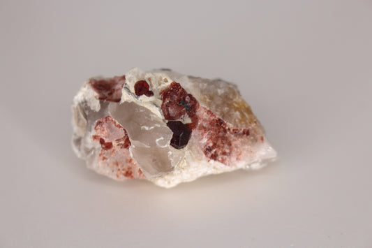 Spessartine Garnets on Quartz w/ Feldspar and Schorl