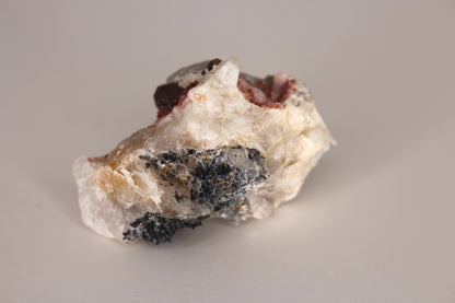 Spessartine Garnets on Quartz w/ Feldspar and Schorl