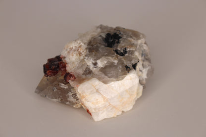 Spessartine Garnets on Quartz w/ Mica, Feldspar and Schorl