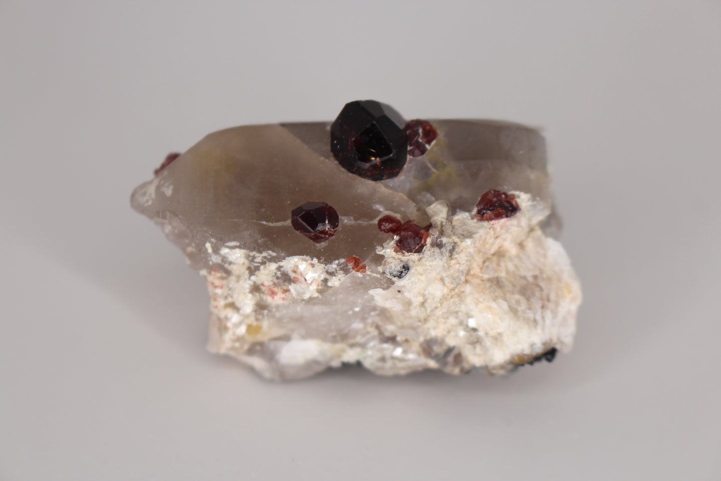 Spessartine Garnets on Quartz w/ Mica and Schorl