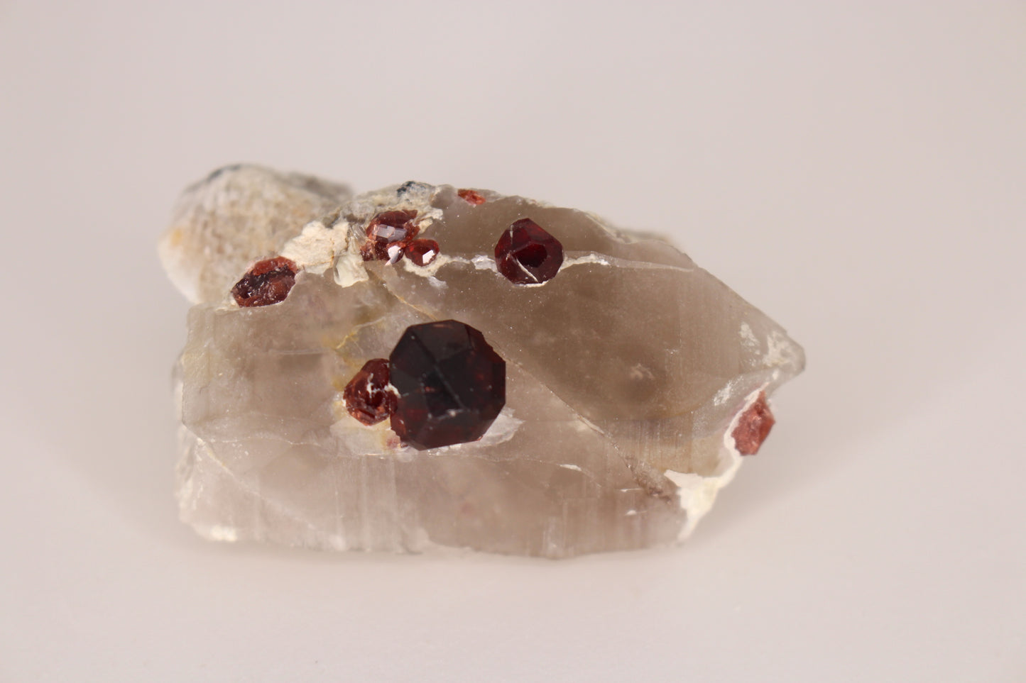 Spessartine Garnets on Quartz w/ Mica and Schorl