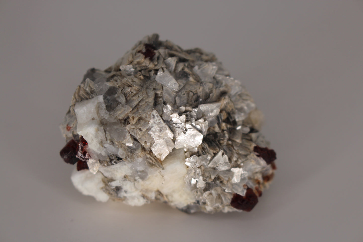 Etched Spessartine Garnet on Feldspar w/ Mica