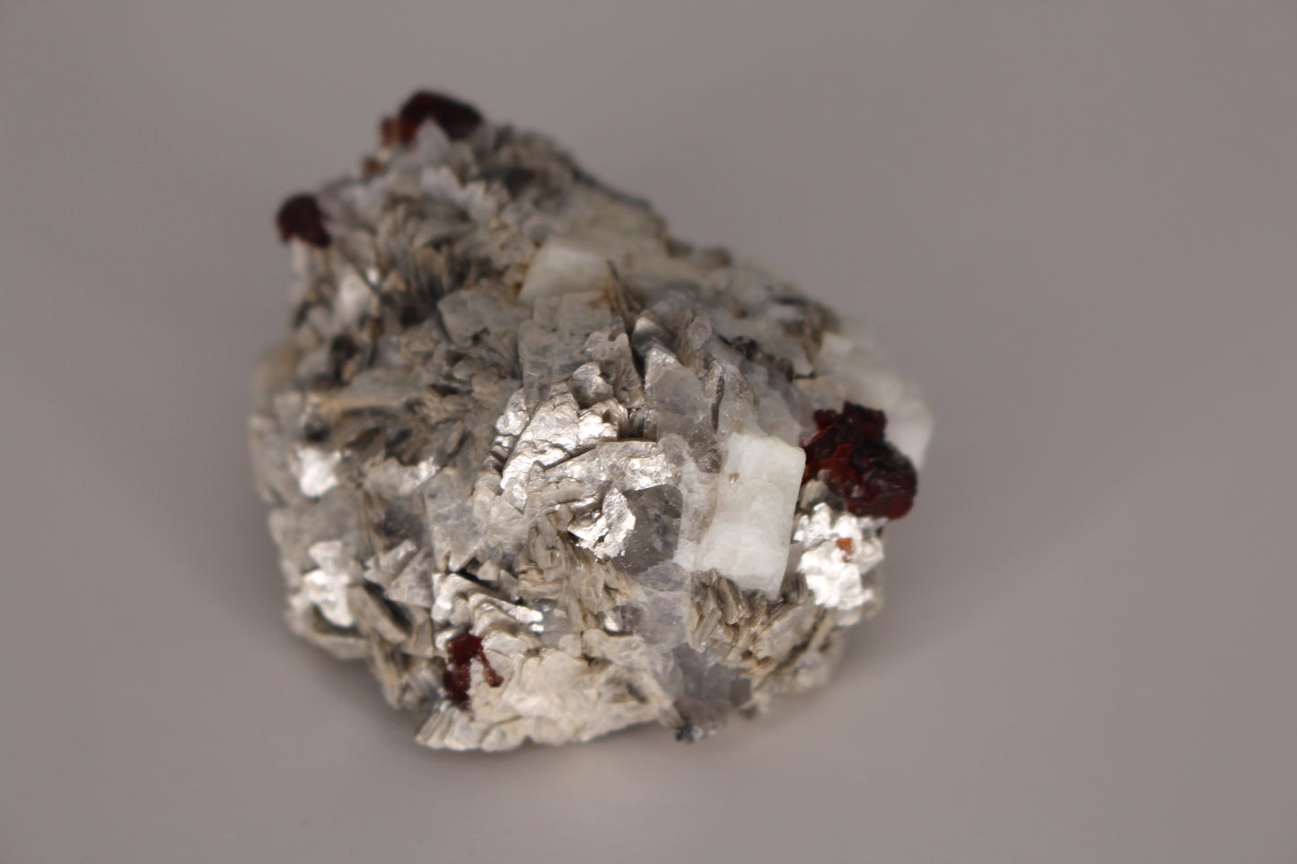 Etched Spessartine Garnet on Feldspar w/ Mica