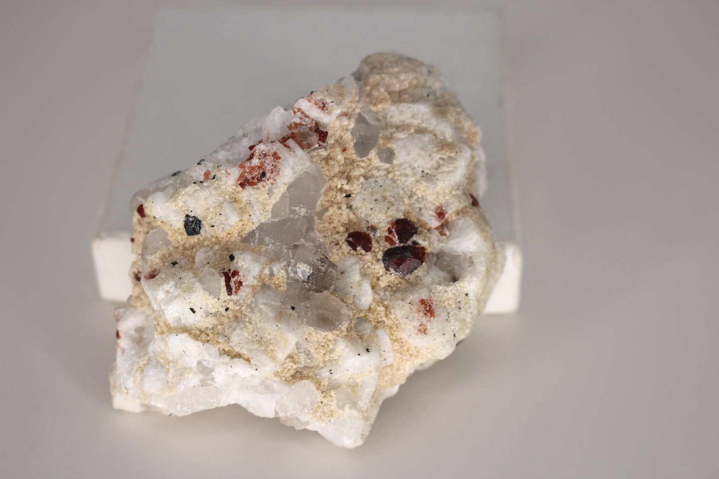 Etched Spessartine Garnets on Quartz w/ Schorl