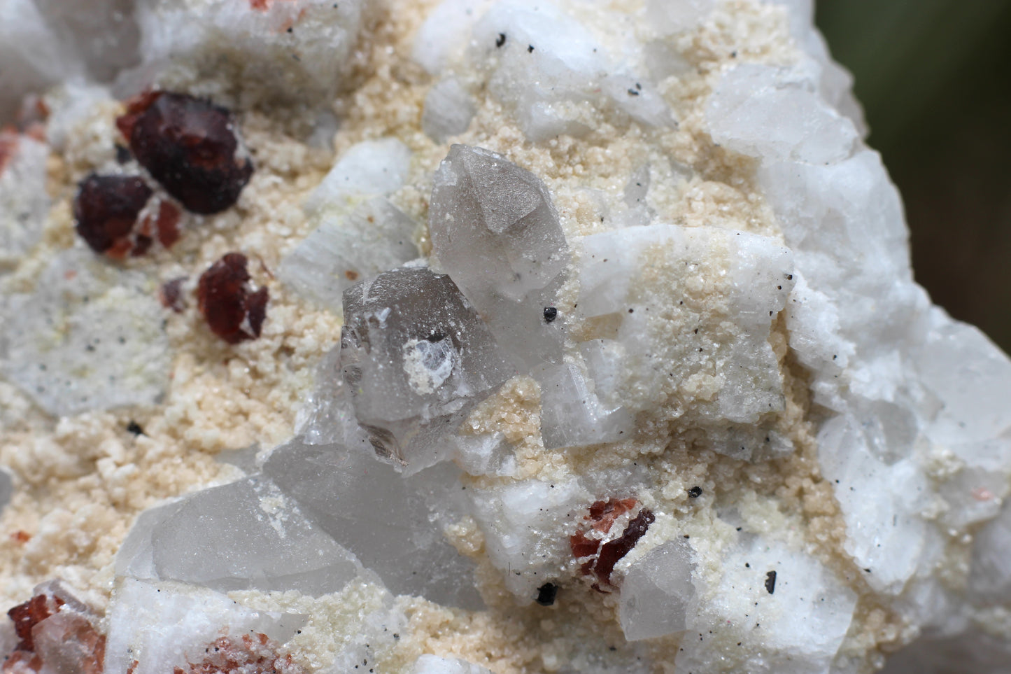 Etched Spessartine Garnets on Quartz w/ Schorl