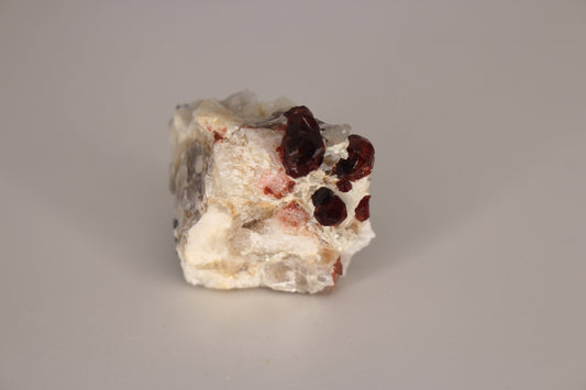 Spessartine Garnets on Quartz w/ Mica, Feldspar and Schorl