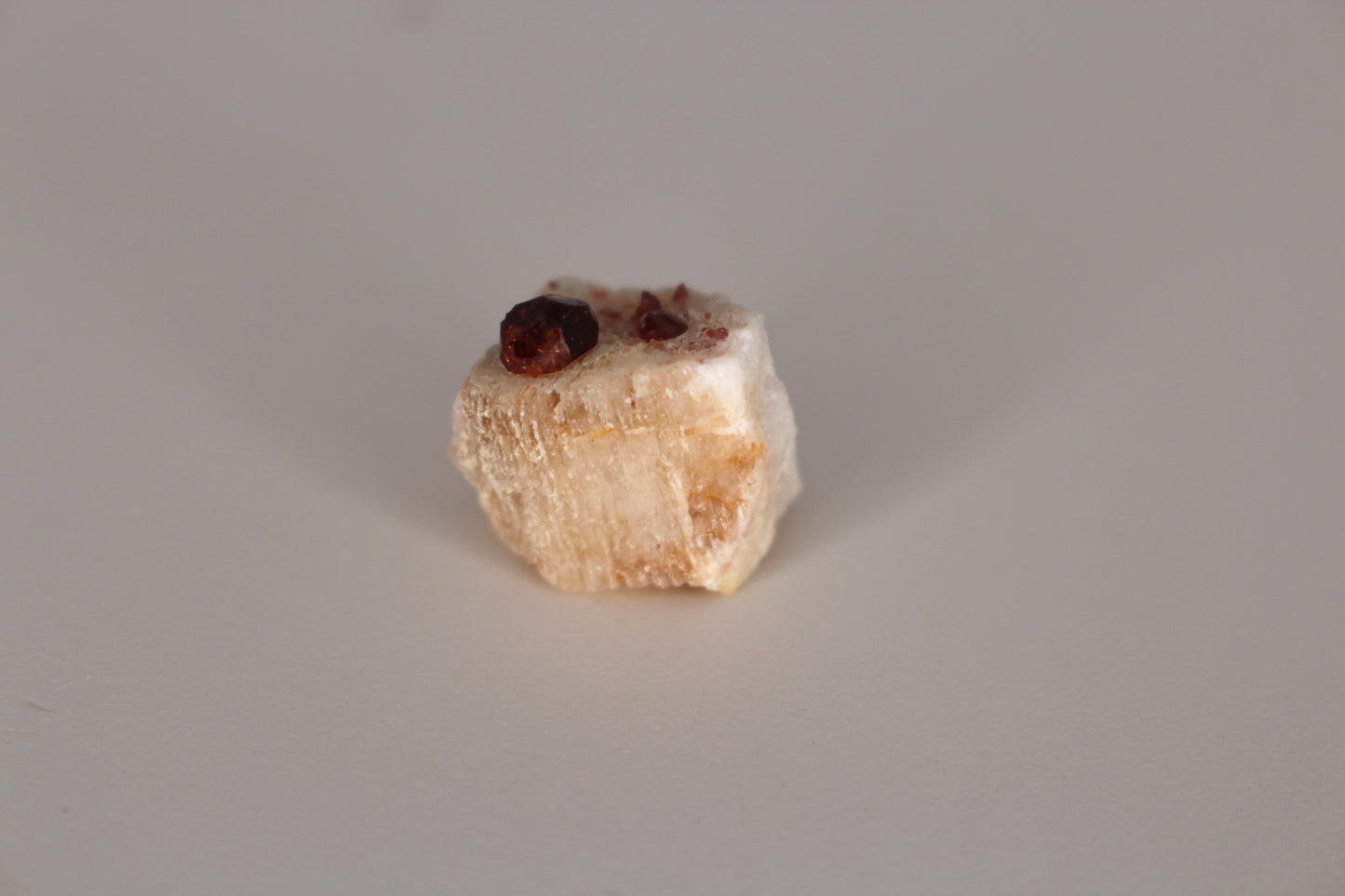 Spessartine Garnet on Feldspar