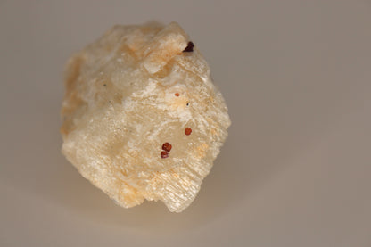 Etched Spessartine Garnet on Feldspar