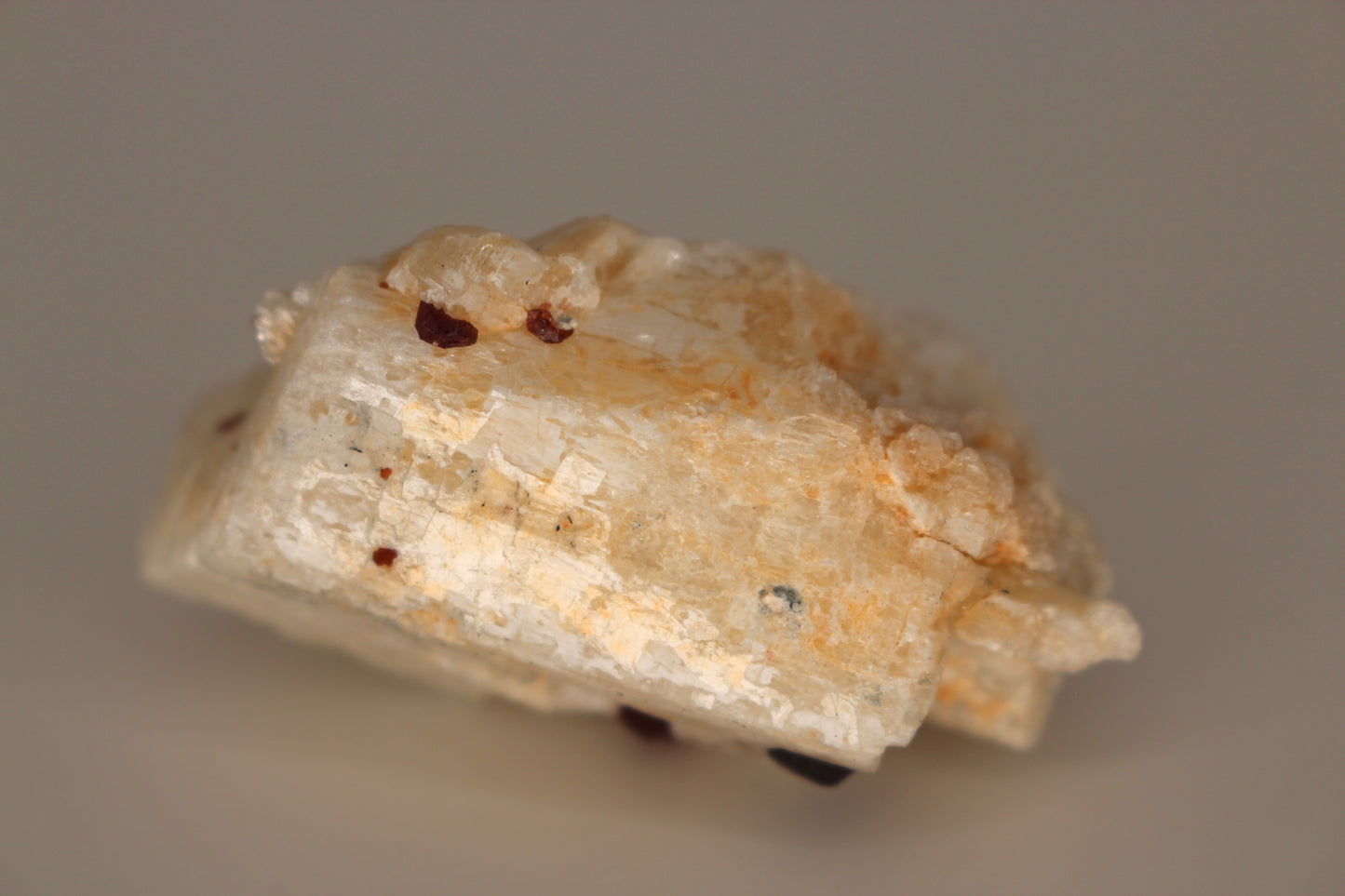 Etched Spessartine Garnet on Feldspar