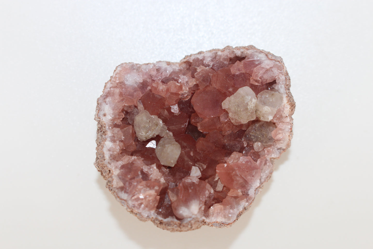 UV Reactive Calcite in Pink Amethyst Geode