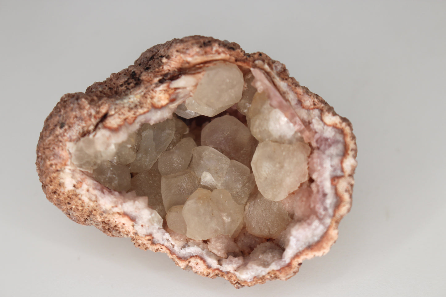 UV Reactive Calcite in Pink Amethyst Geode