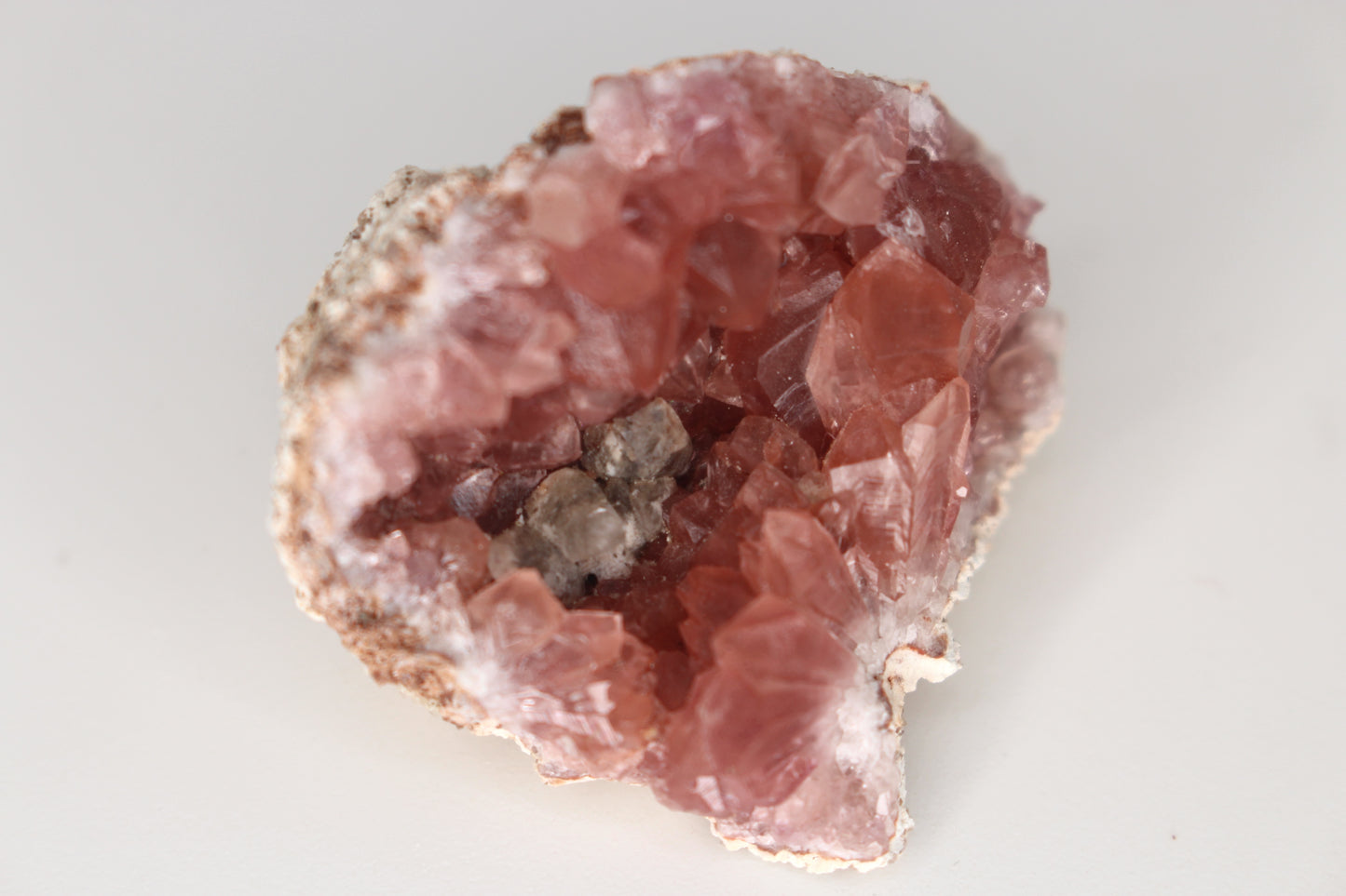 UV Reactive Calcite in Pink Amethyst Geode