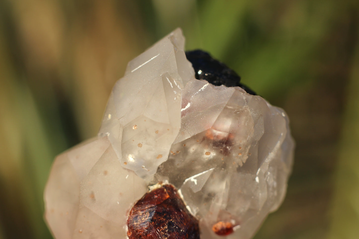 Etched Spessartine Garnet on Quartz w/ Schorl