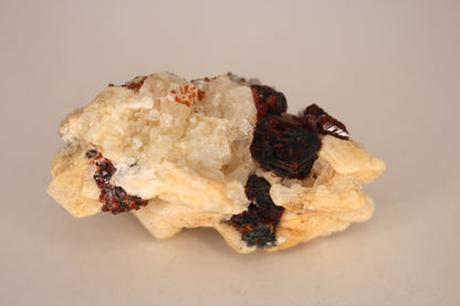 Etched Spessartine Garnet on Feldspar