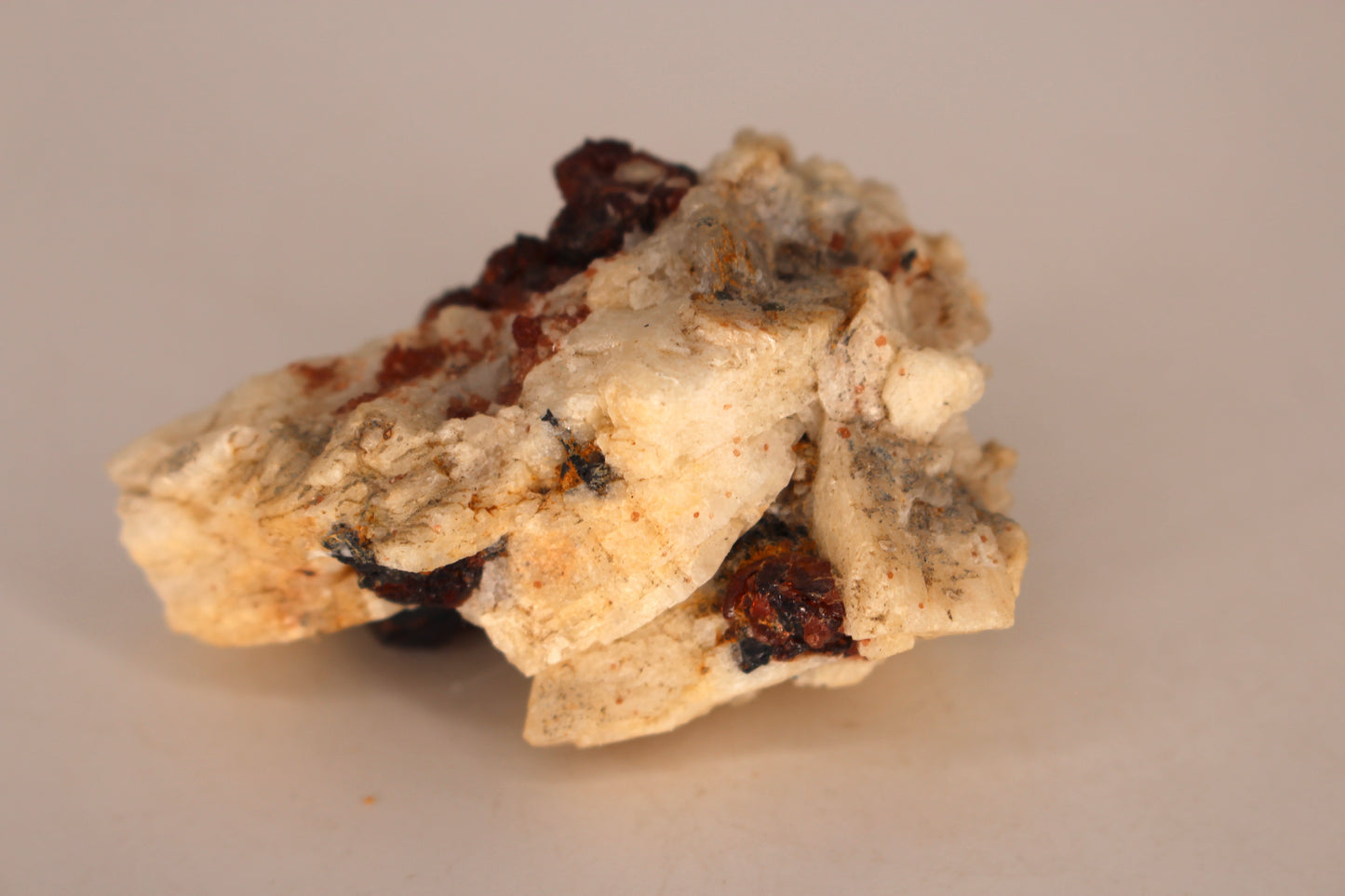 Etched Spessartine Garnet on Feldspar