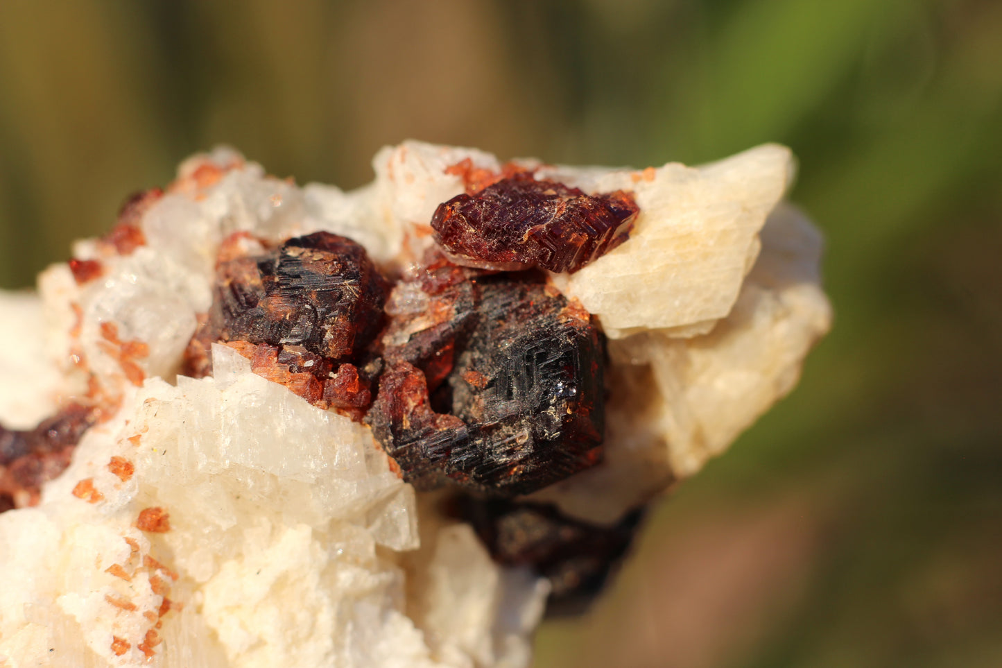 Etched Spessartine Garnet on Feldspar