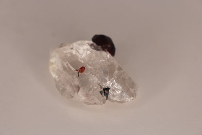 Etched Spessartine Garnet on Quartz