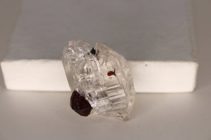 Etched Spessartine Garnet on Quartz