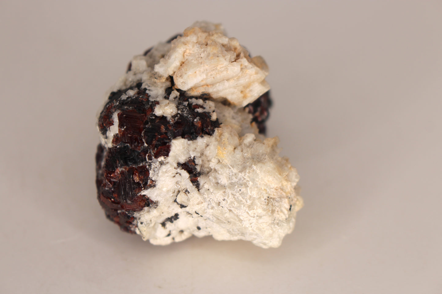 Etched Spessartine Garnet on Feldspar