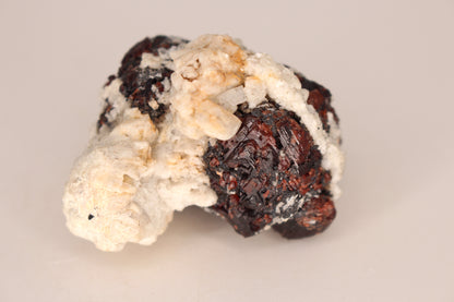 Etched Spessartine Garnet on Feldspar