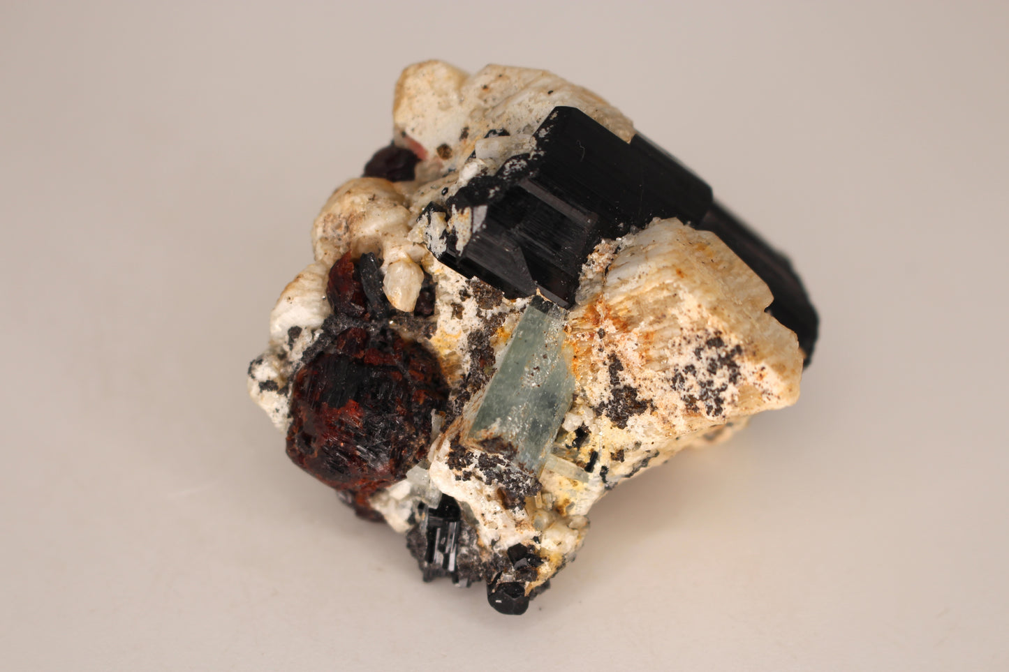 Etched Spessartine Garnet, Aquamarine and Schorl on Feldspar