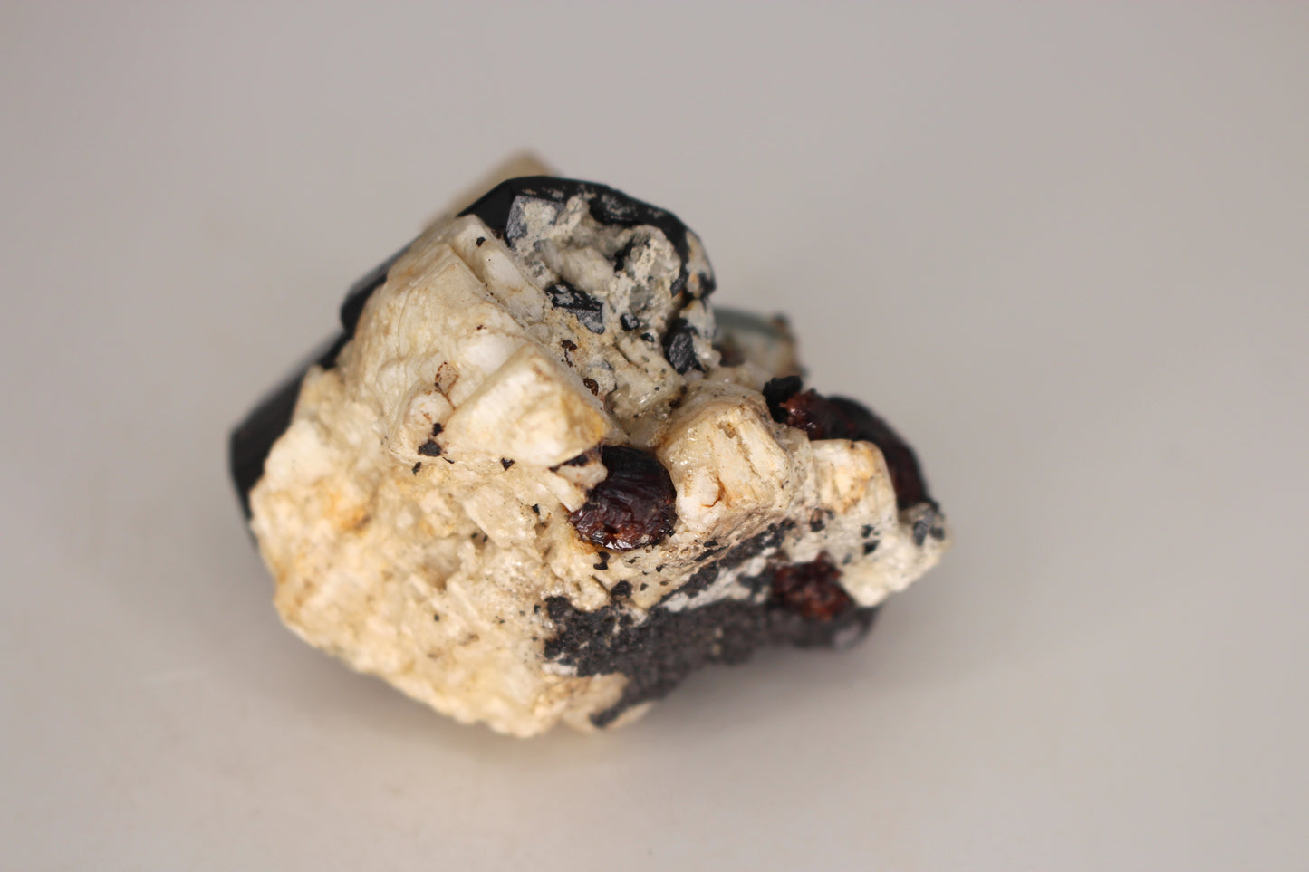 Etched Spessartine Garnet, Aquamarine and Schorl on Feldspar