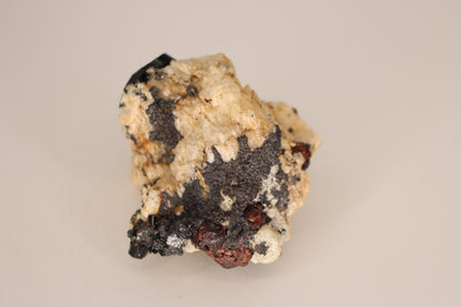 Etched Spessartine Garnet, Aquamarine and Schorl on Feldspar