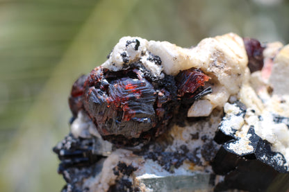 Etched Spessartine Garnet, Aquamarine and Schorl on Feldspar