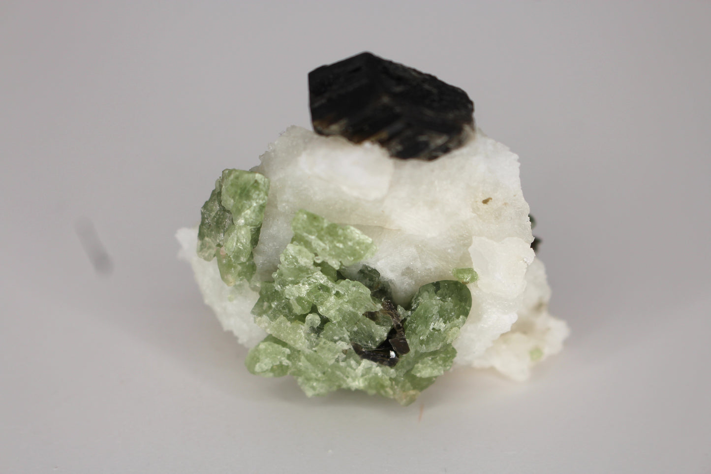 Diopside on Quartz w/ Mica