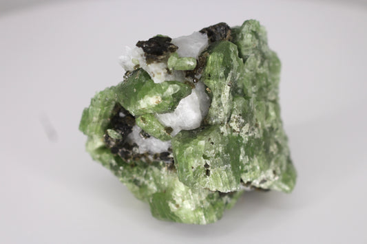 Diopside on Quartz w/ Mica