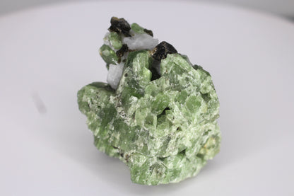 Diopside on Quartz w/ Mica