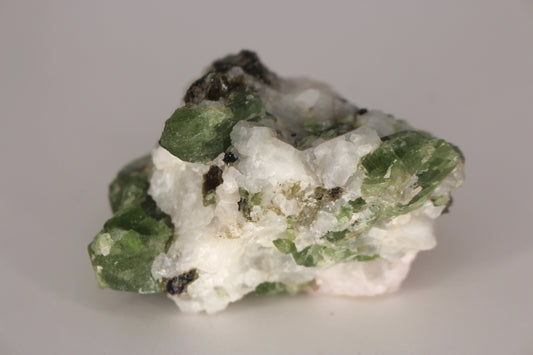 Diopside on Quartz w/ Mica