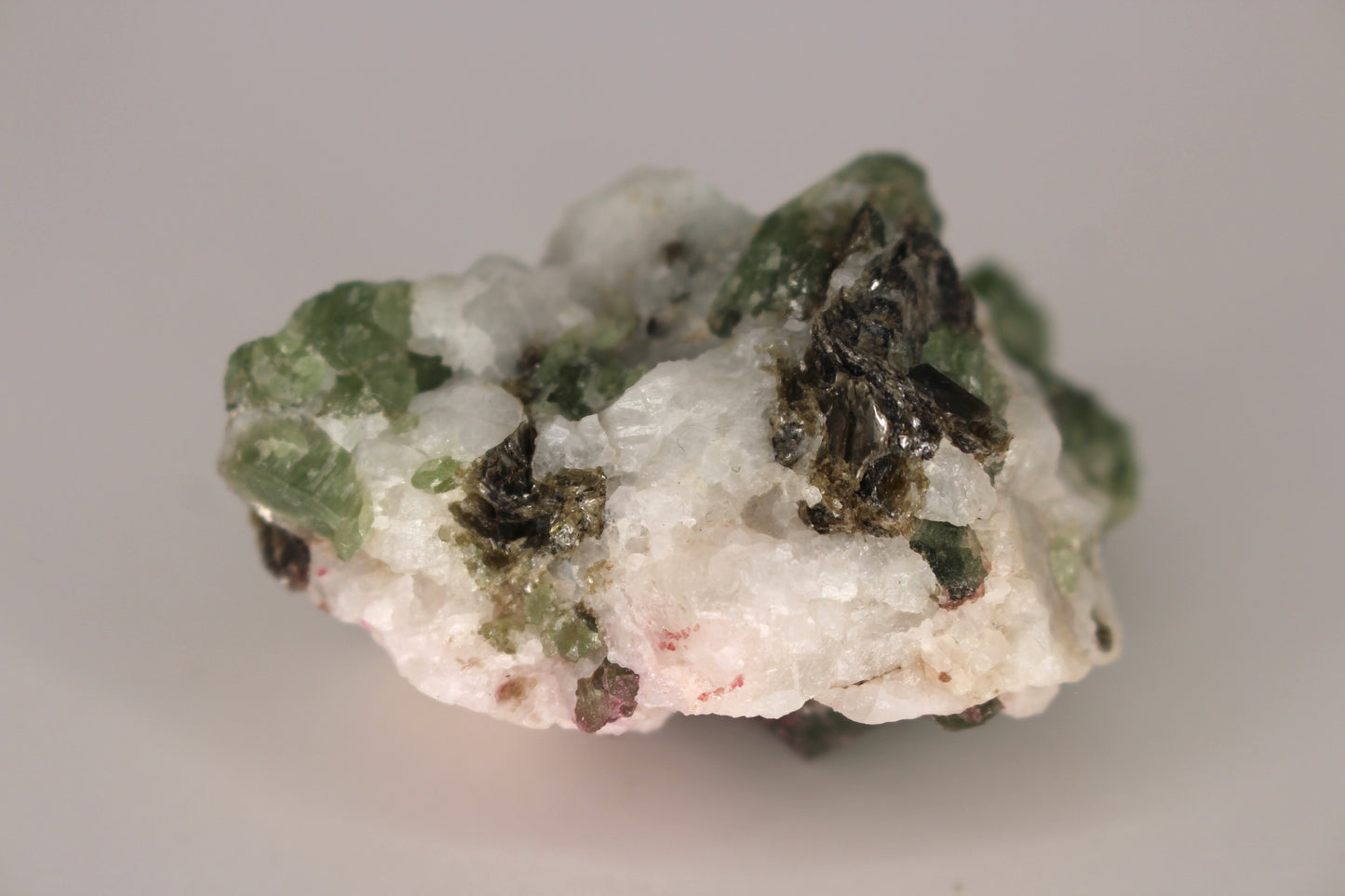 Diopside on Quartz w/ Mica