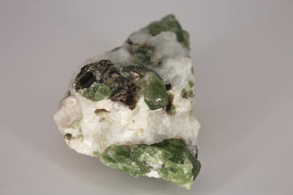 Diopside on Quartz w/ Mica