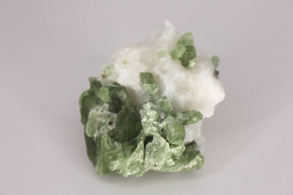 Diopside on Quartz w/ Mica