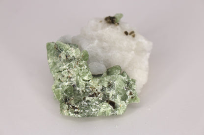 Diopside on Quartz w/ Mica